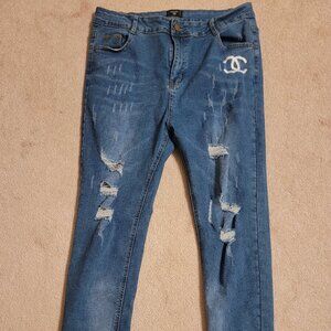Fashion distressed women's denim blue jeans Size 14 / 34